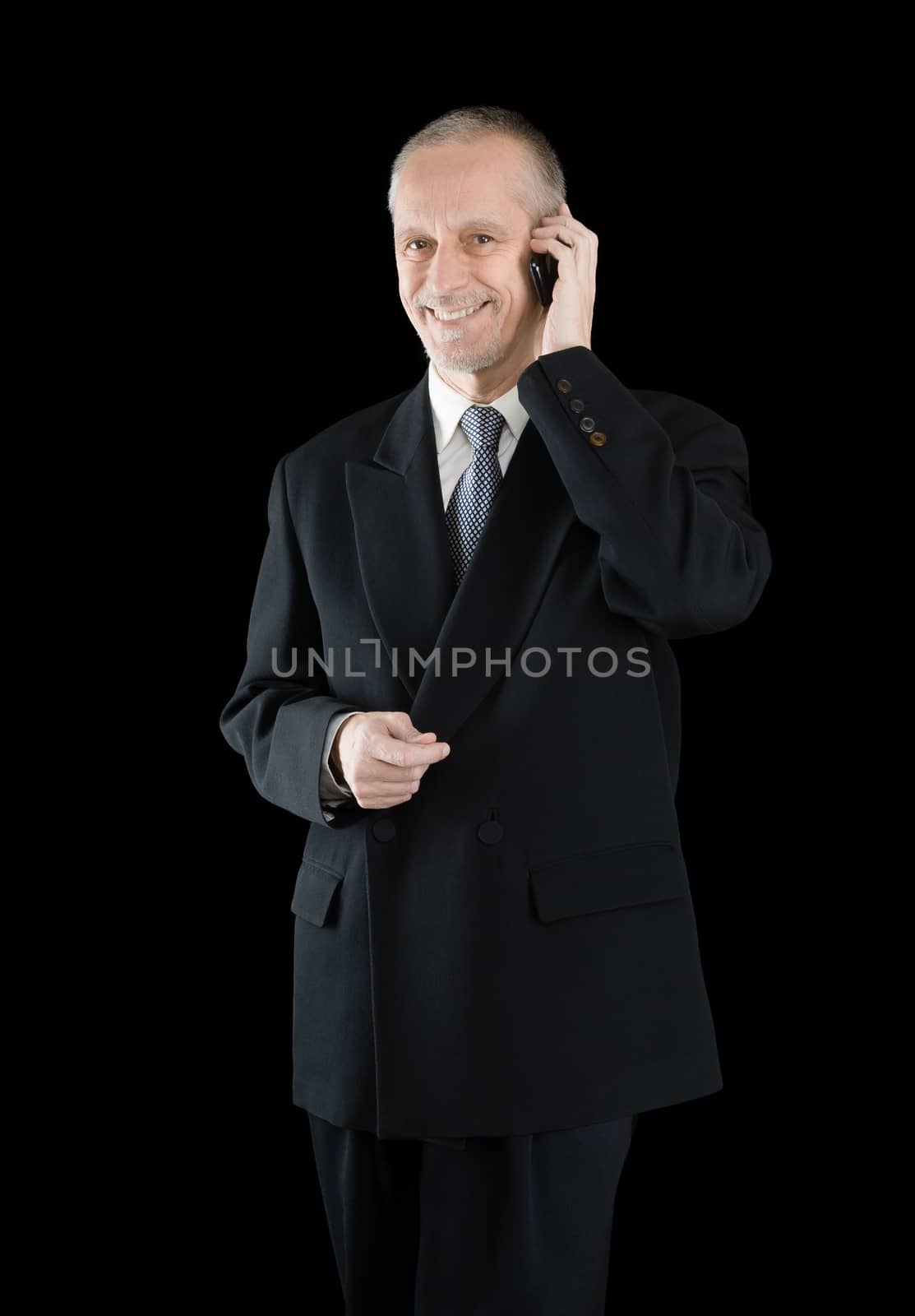 Amiable and Smiling Businessman on Phone by MaxalTamor