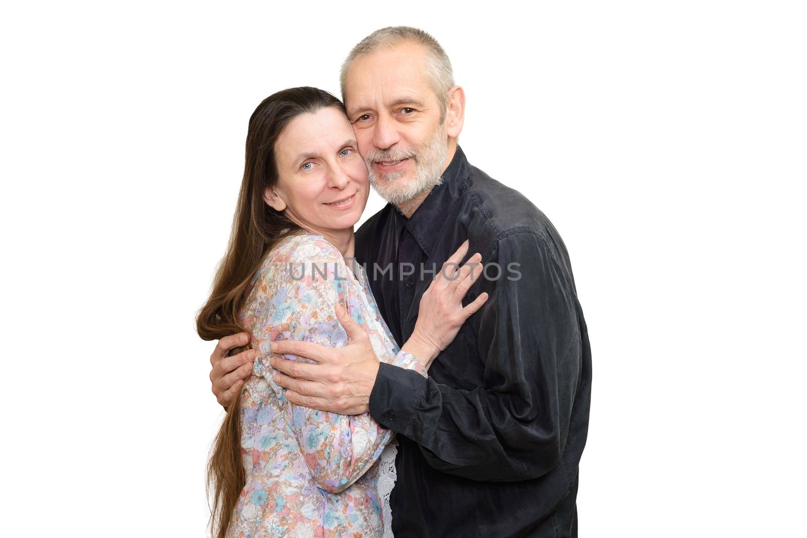 Mature man and woman with long hair embracing each other with love for S. Valentine's day or anniversary. Isolated on white background.
