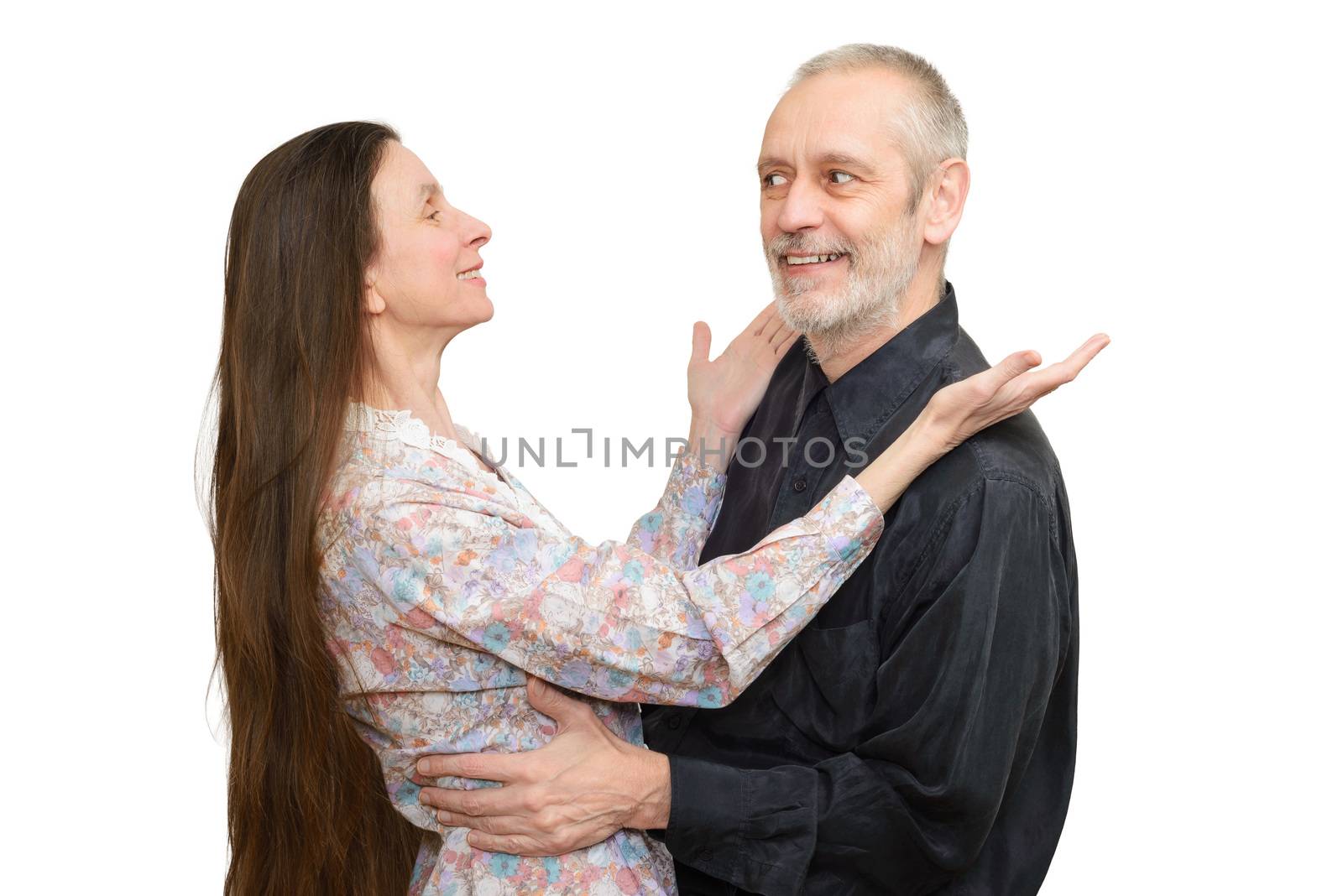 Mature man and woman with long hair looking at each other with love, eyes in eyes, for S. Valentine's day or anniversary. Isolated on white background.