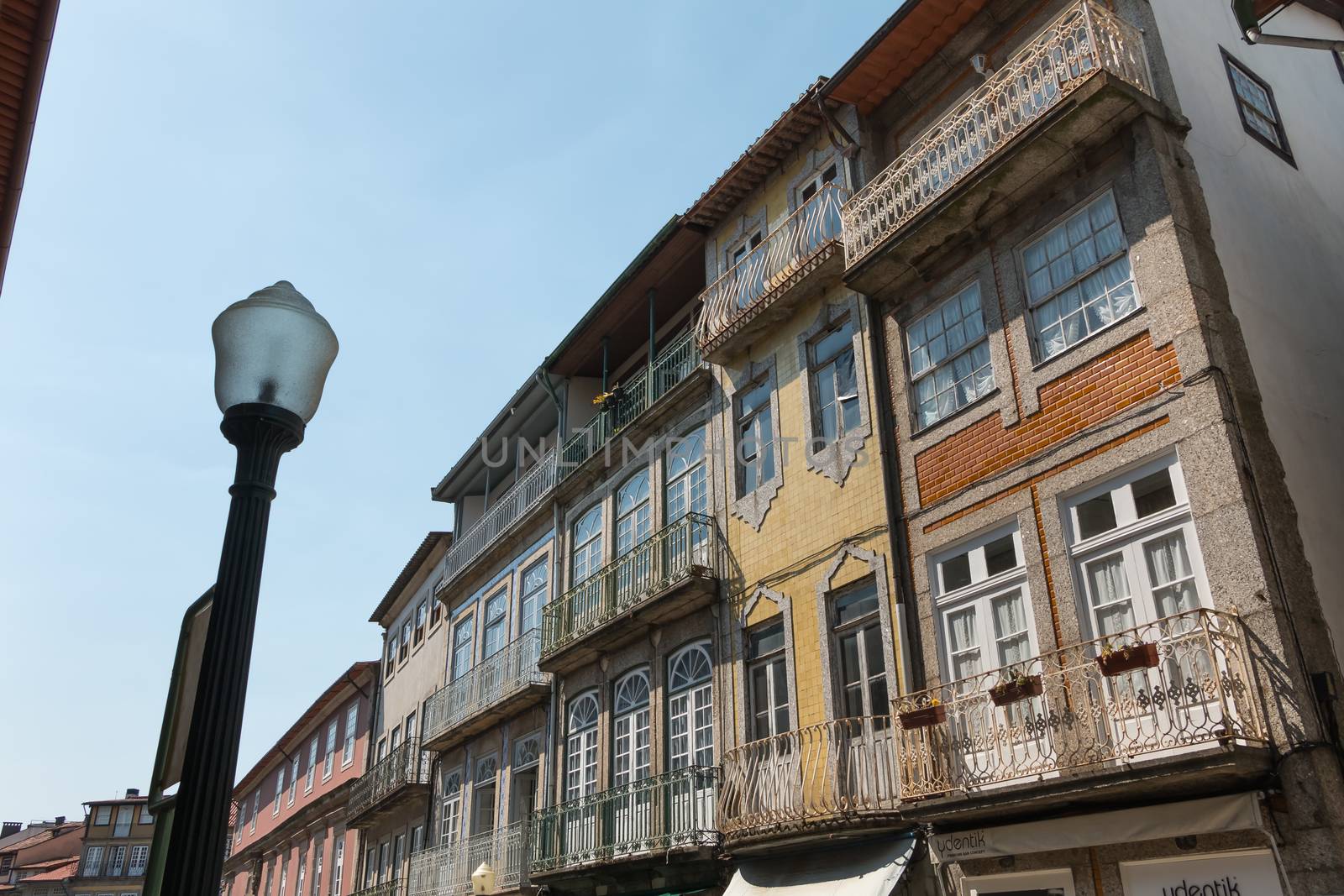 Architecture detail of houses typical of guimaraes, portugal by AtlanticEUROSTOXX