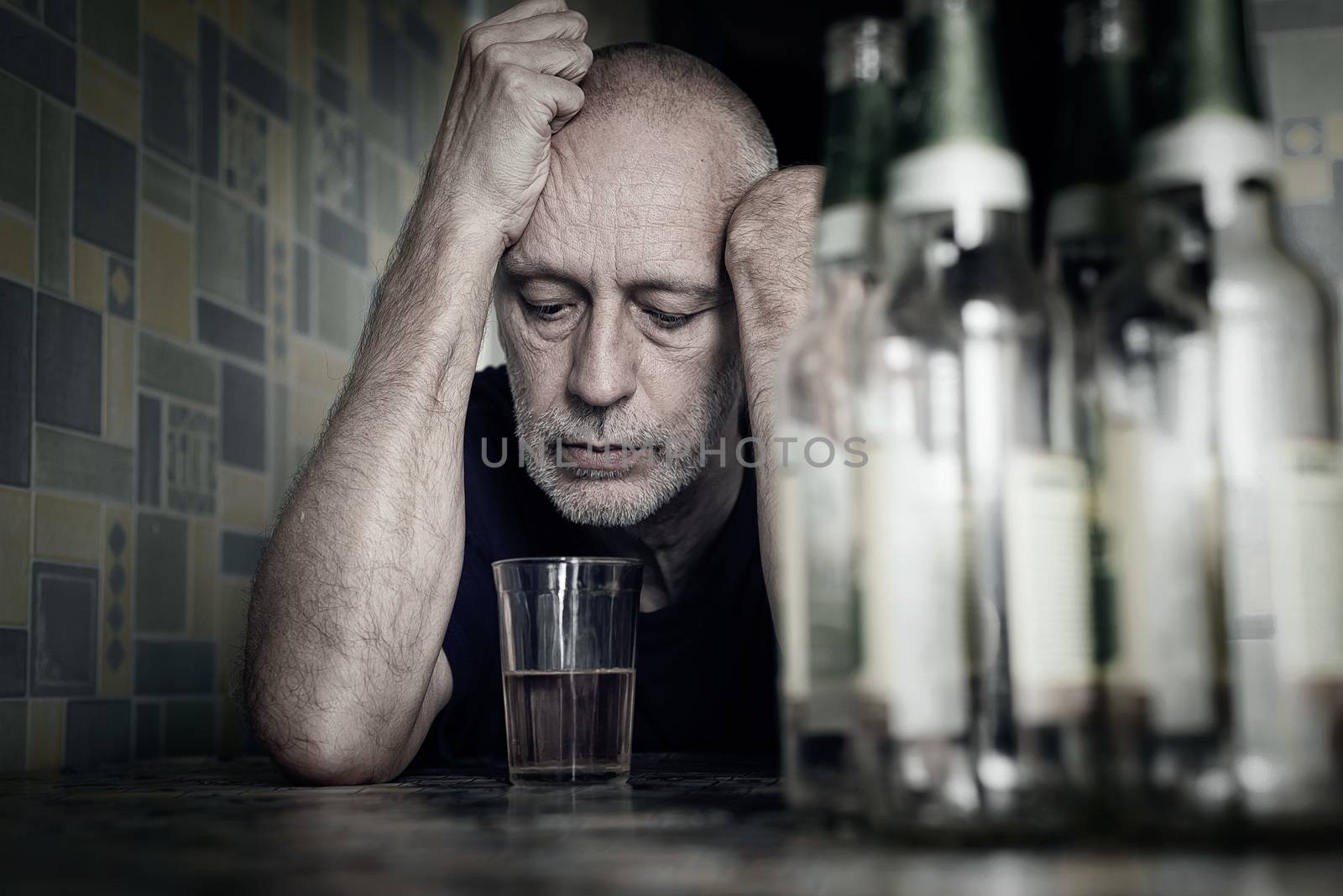 Desperate man falling into depression and becoming alcoholic by MaxalTamor
