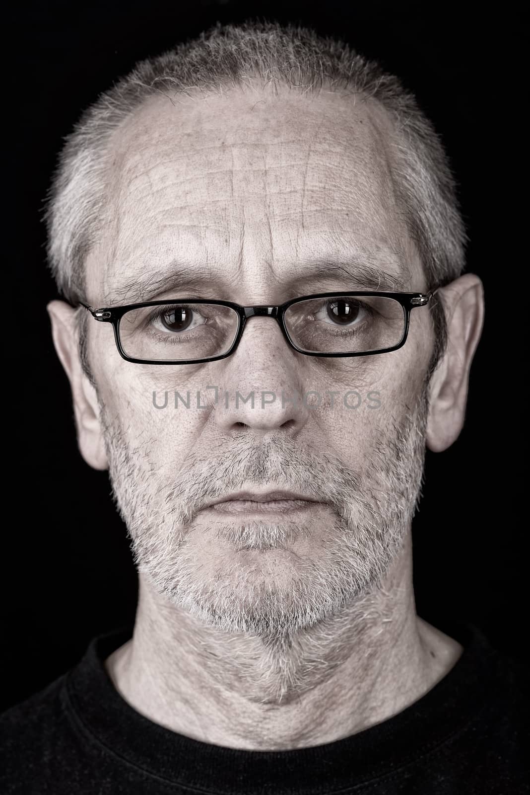 Portrait of a Serious Man Wearing Glasses by MaxalTamor