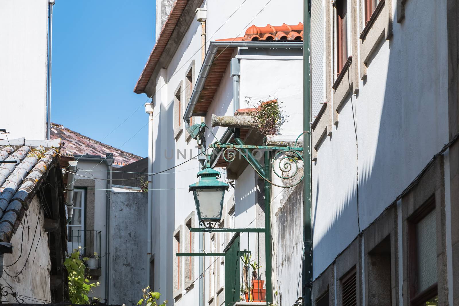 Viana Do Castelo, Portugal, Portugal - May 10, 2018: Architecture detail of typical houses and shops in the streets of the historic city center that tourists visit on a spring day