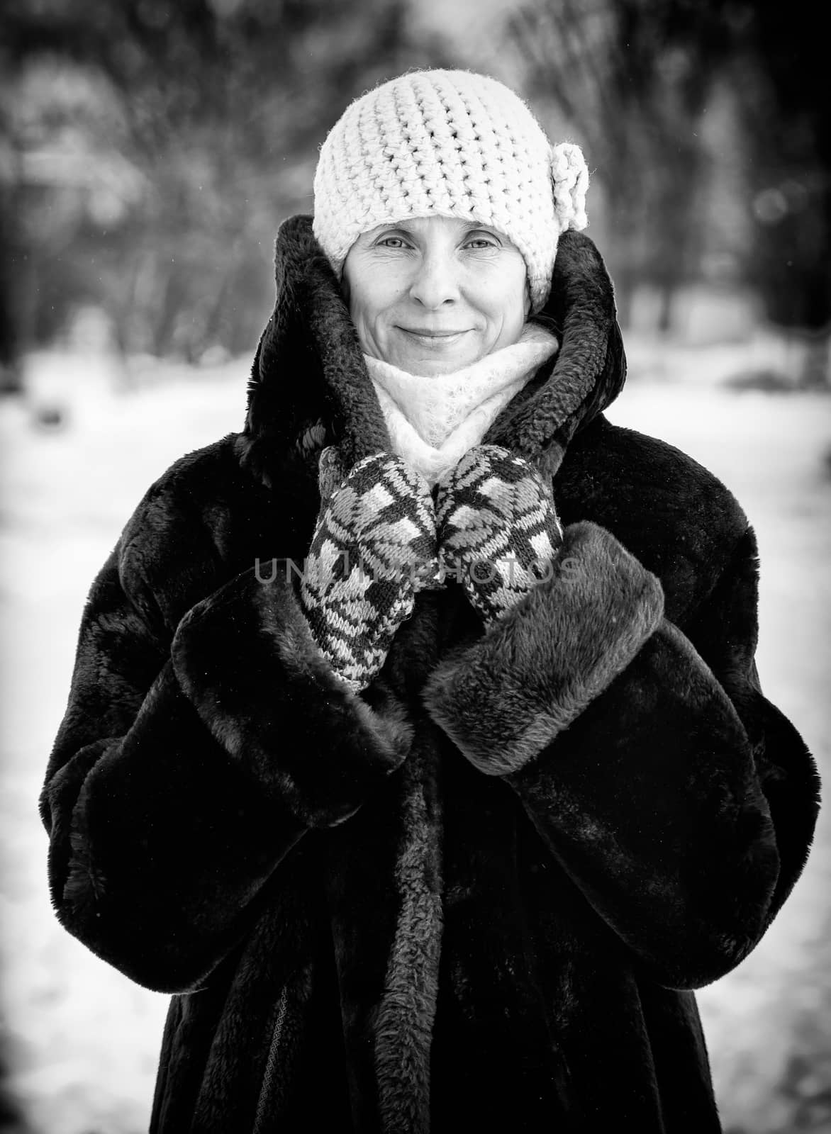 Winter Portrait of Woman with a Snow Background by MaxalTamor