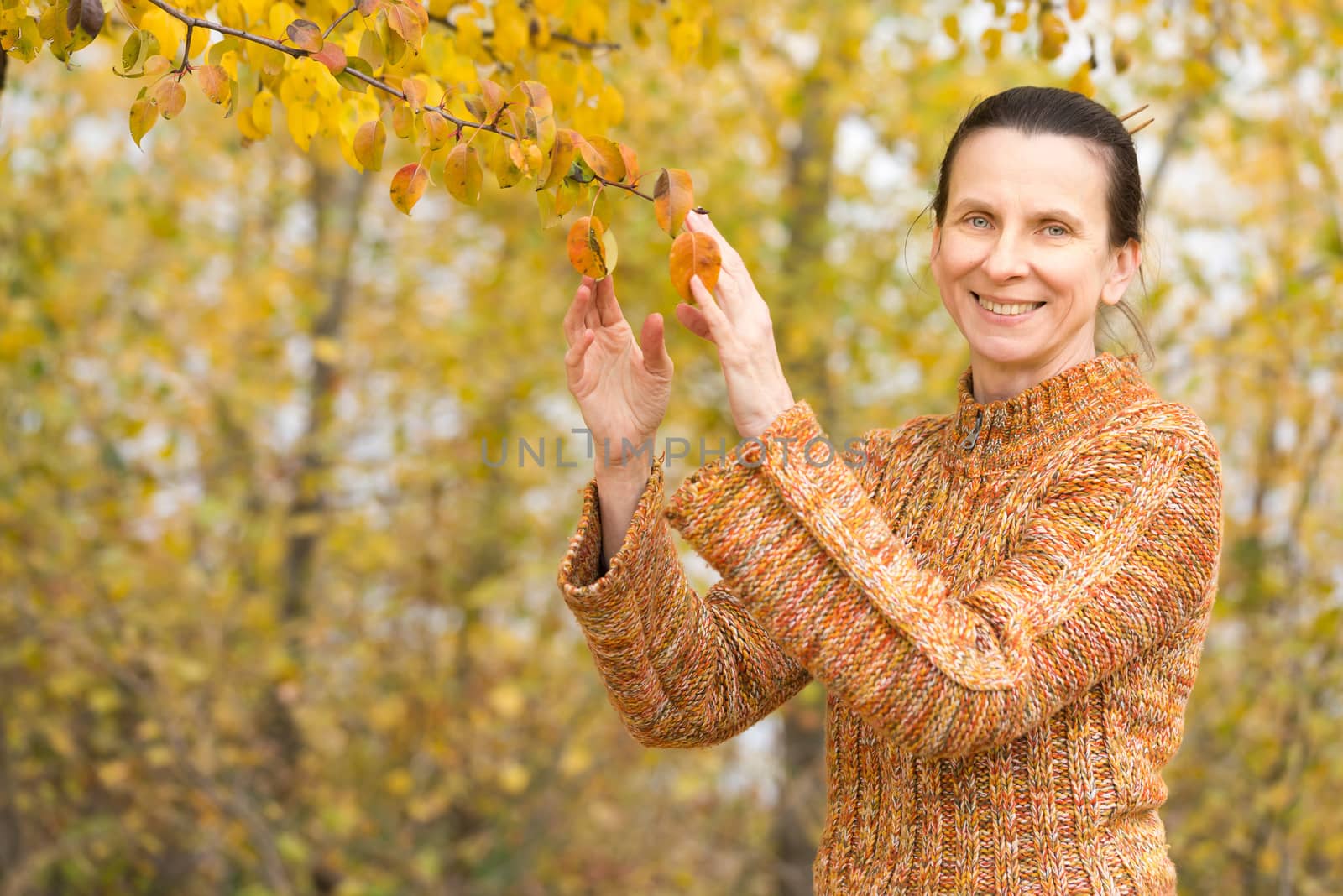 Woman Picking Leaves in Autumn by MaxalTamor