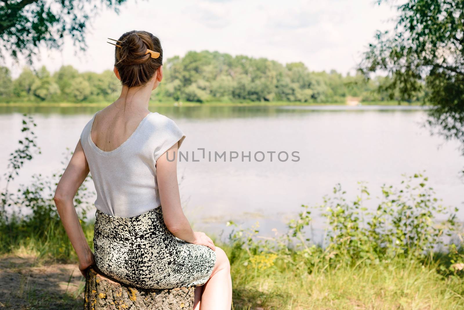 Woman Sitting Close to the River by MaxalTamor