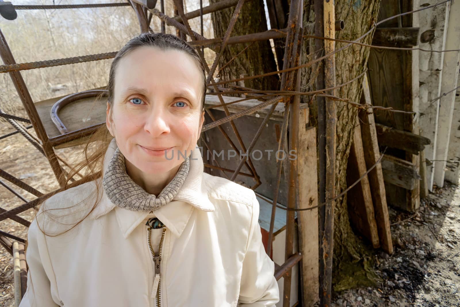 Smiling sweet and benevolent adult woman outdoor during a nice spring day