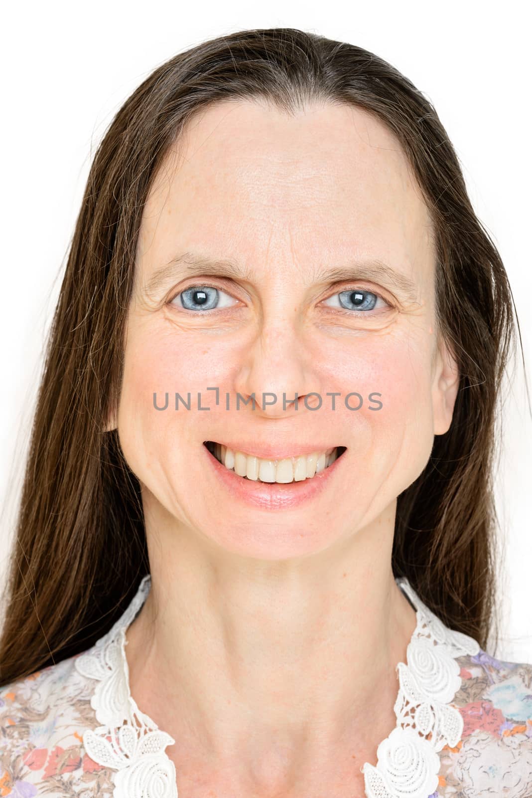 A happy mature woman smiling with mouth and eyes