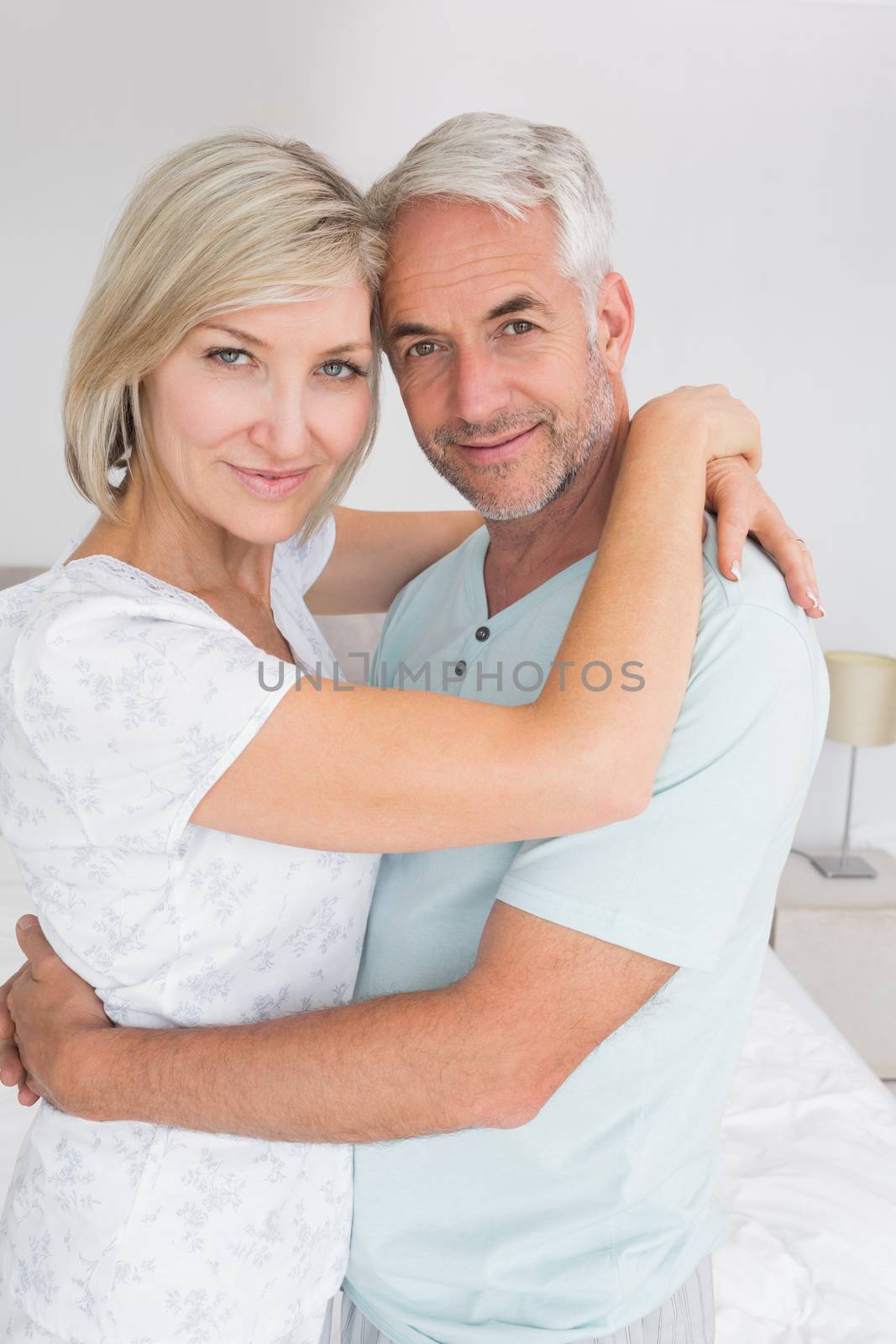 Closeup portrait of a loving mature couple at home