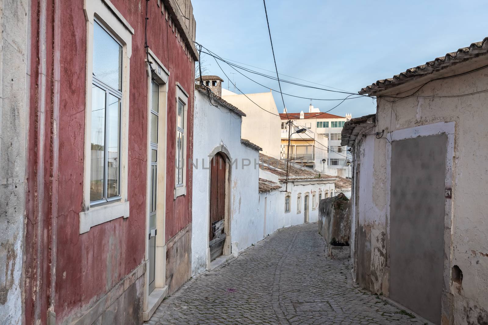 Loule, Faro, Portugal - February 25, 2020: architectural detail of pretty little typical house in the city center on a winter day