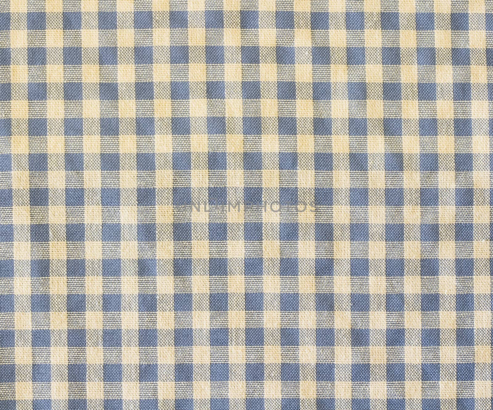 Texture of blue plaid fabric as background