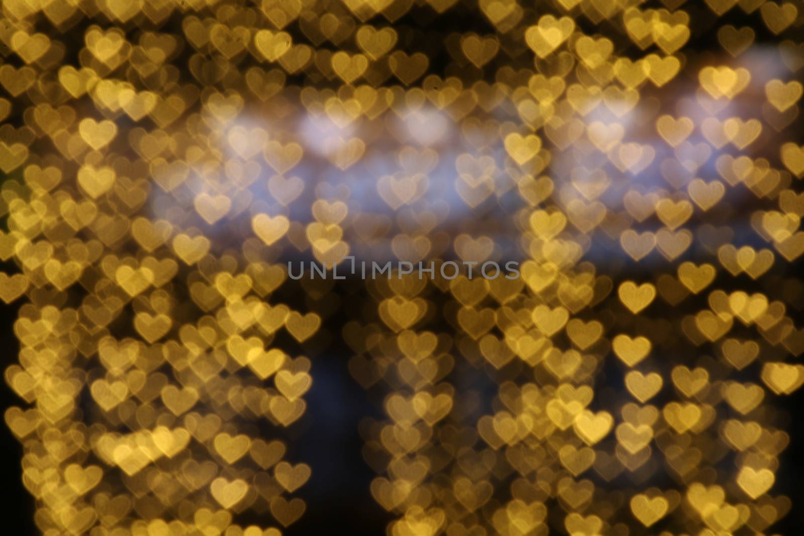 Yellow gold heart-shaped hanging valentine background Colorful lighting bokeh white for decoration night backdrop wallpaper blurred valentine, Love Pictures lighting heart shaped soft night abstract by cgdeaw