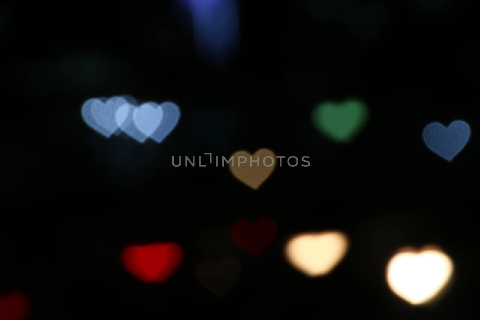 colorful heart-shaped on black background, lighting bokeh for wallpaper, blurred bokeh for valentine's day background, love pictures background, lighting heart shape soft at night time by cgdeaw