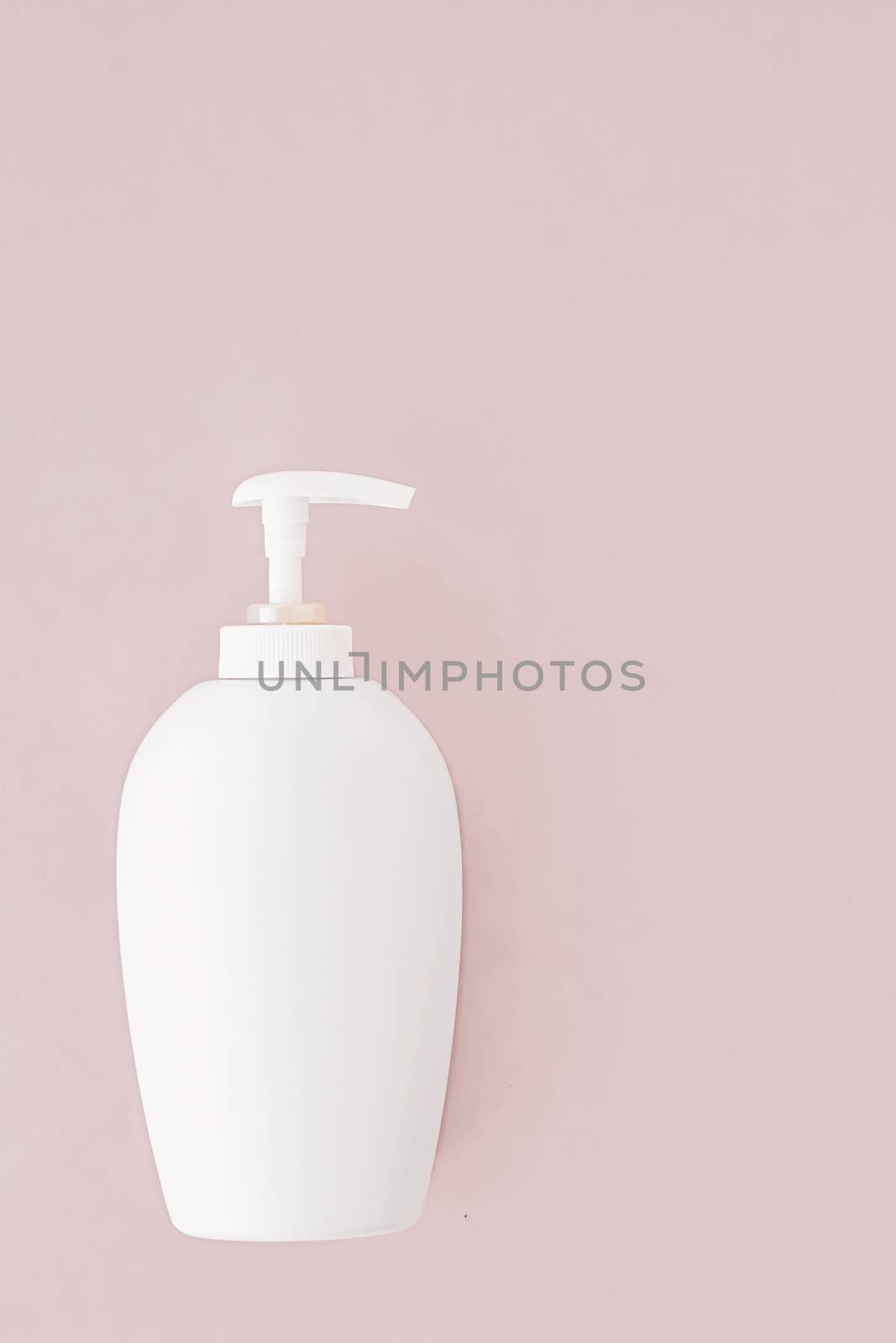 Bottle of antibacterial liquid soap and hand sanitizer on beige background, hygiene product and health care concept