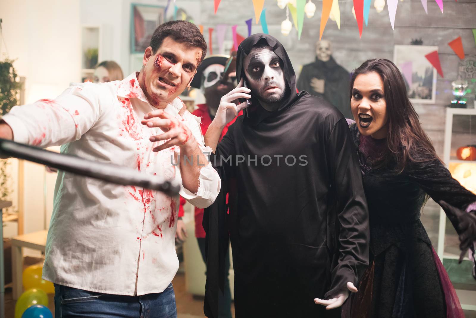 Group of spooky monster at halloween celebration by DCStudio