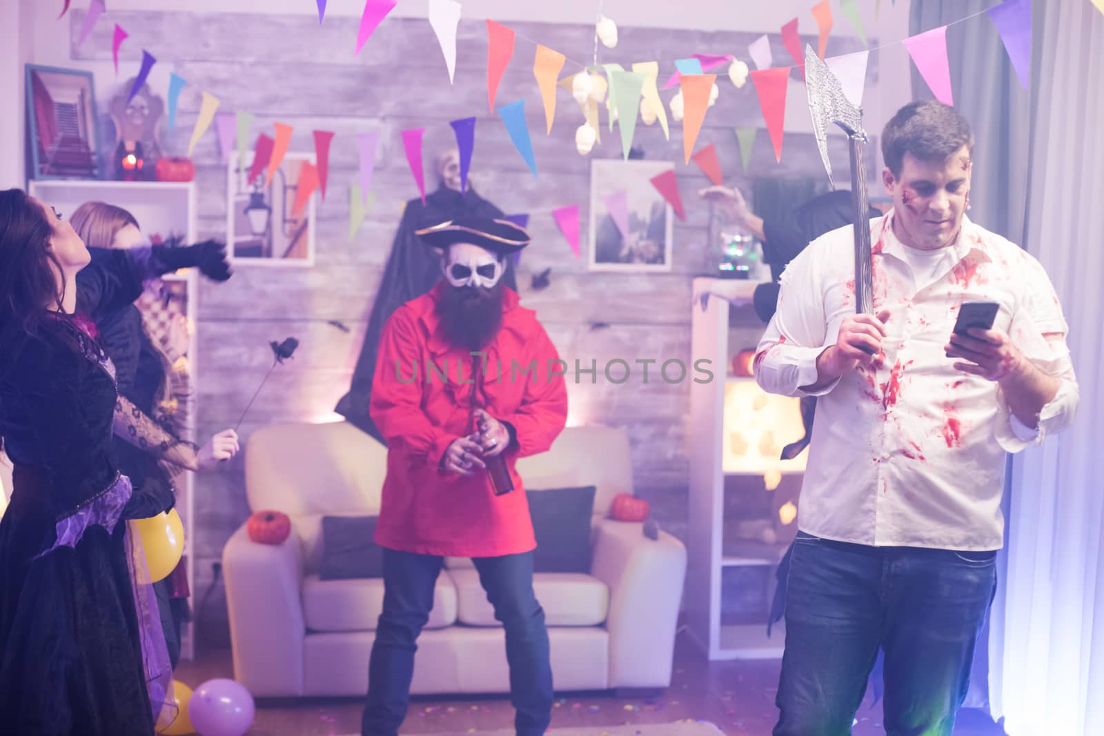 Man dressed up like a zombie at halloween party by DCStudio