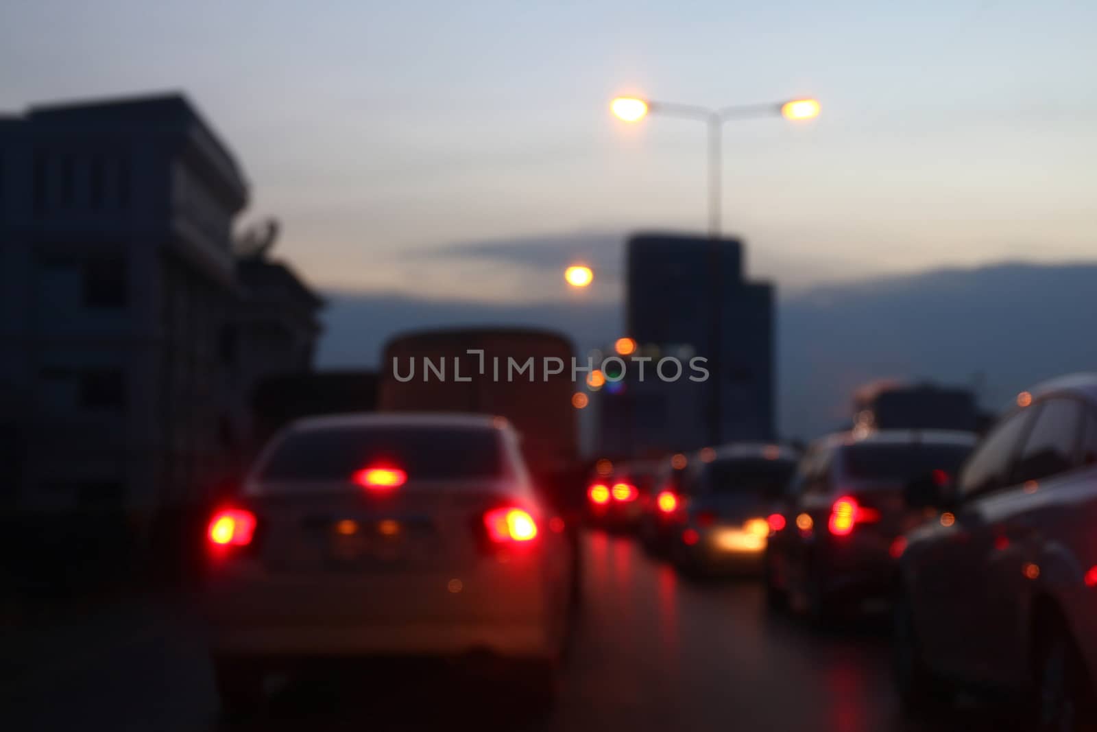 Blurred picture Traffic jam in the evening in the city night for background by cgdeaw