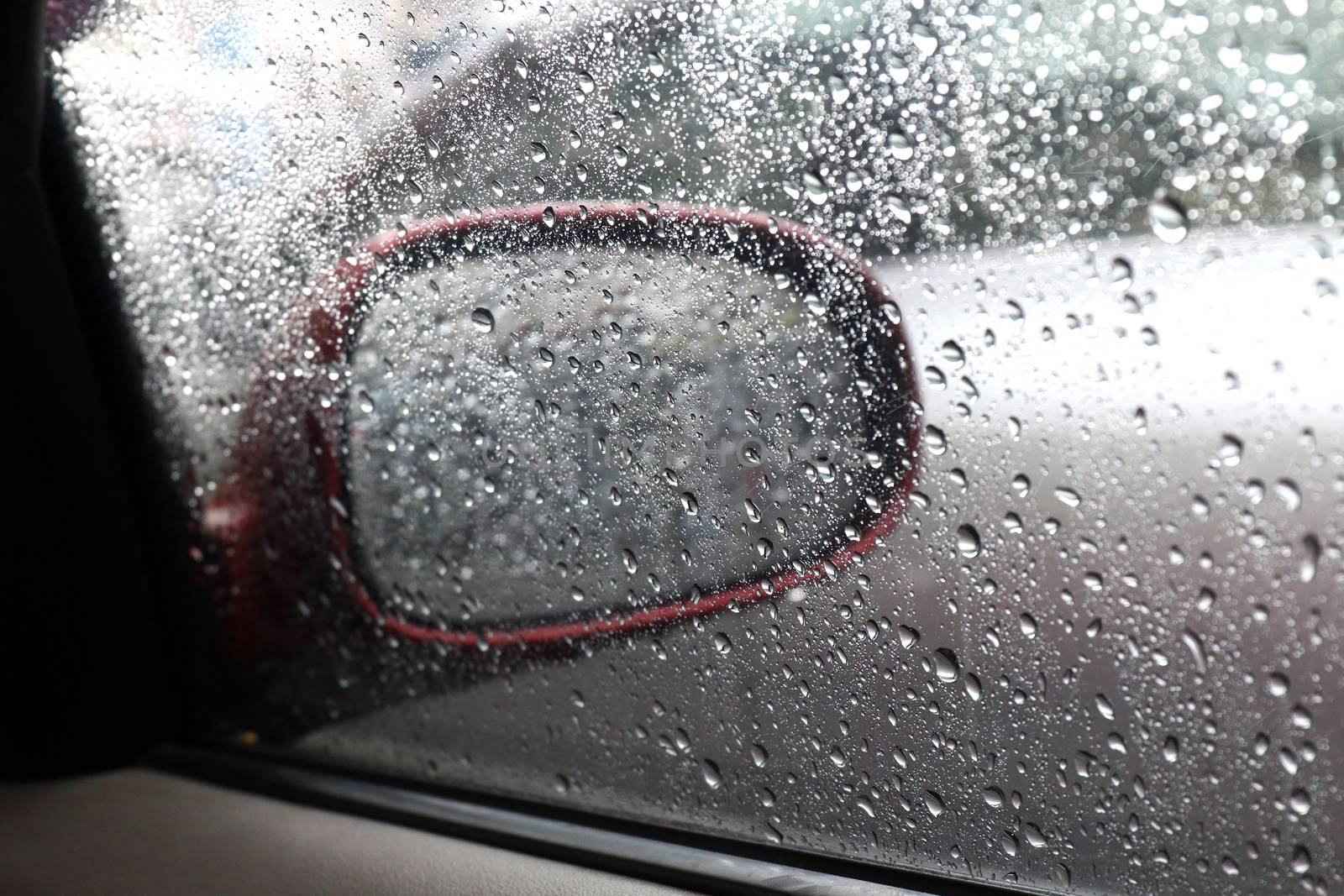 Water drop nature fresh wet background with water raindrops transparency on glass window car mirror side, Alone feeling