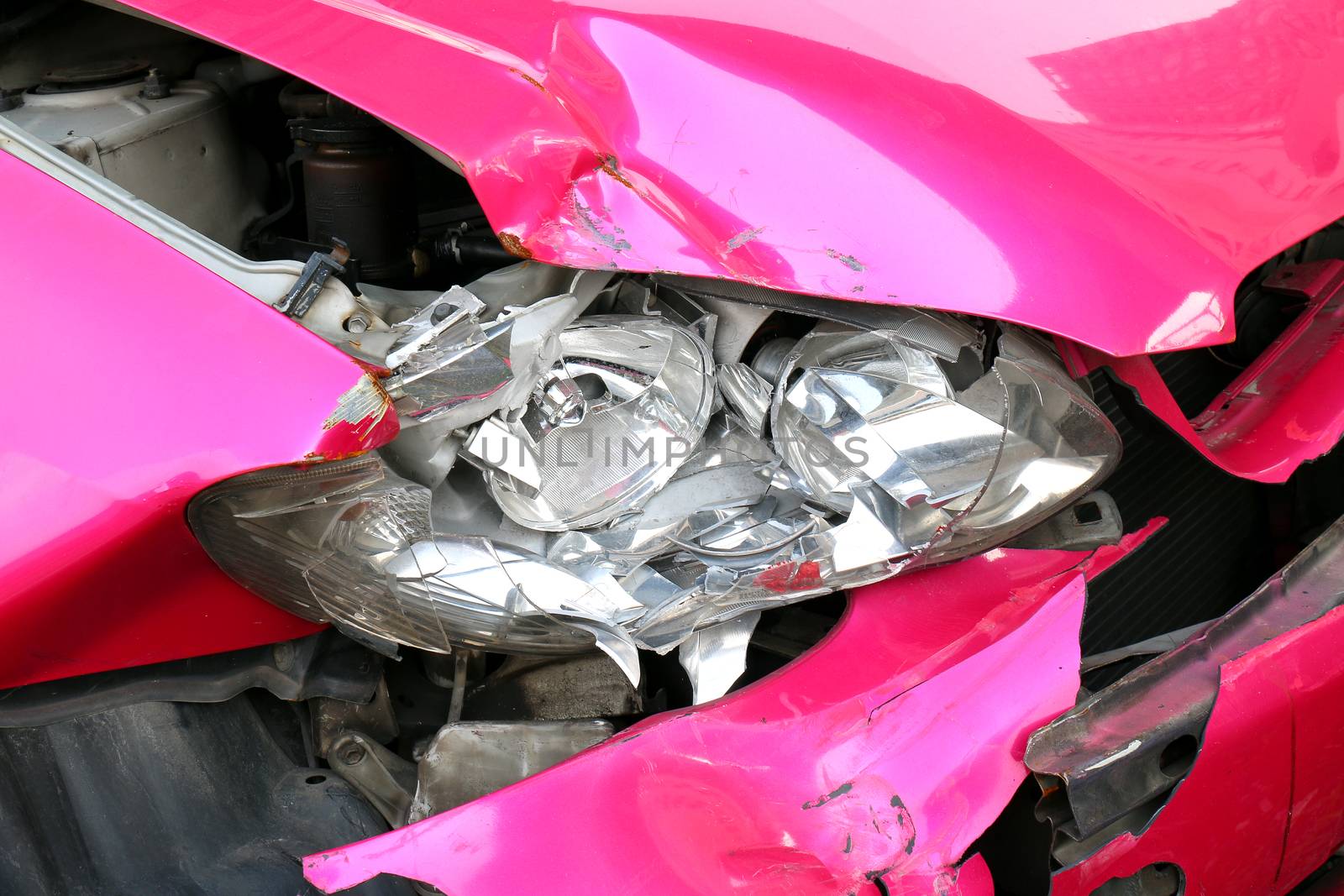 pink car accident damaged to headlights front, broken headlights car crash accident, damaged automobiles after collision of pink car accident by cgdeaw