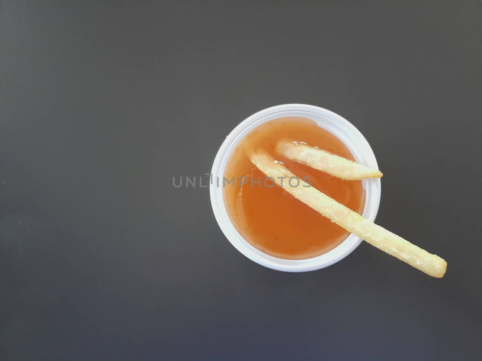 sauce french fries, french fries in chili sauce cup