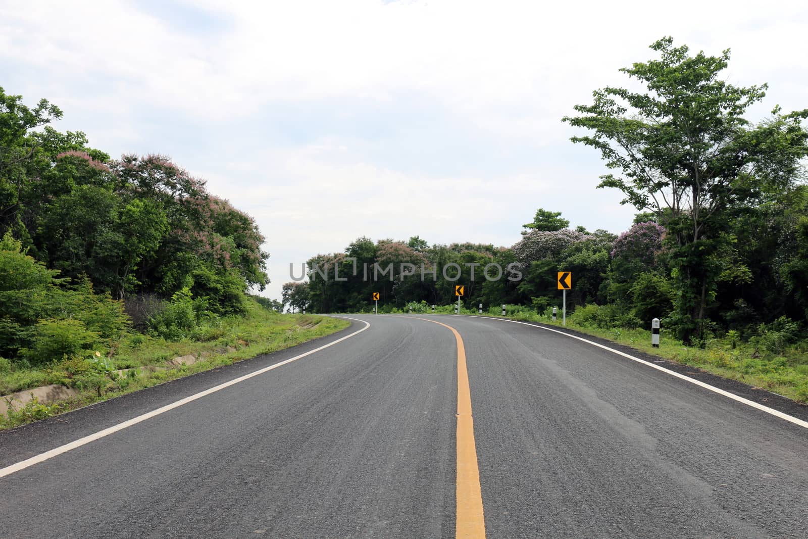 road, street, avenue roadway, countryside road and curve traffic signs in the left Thailand