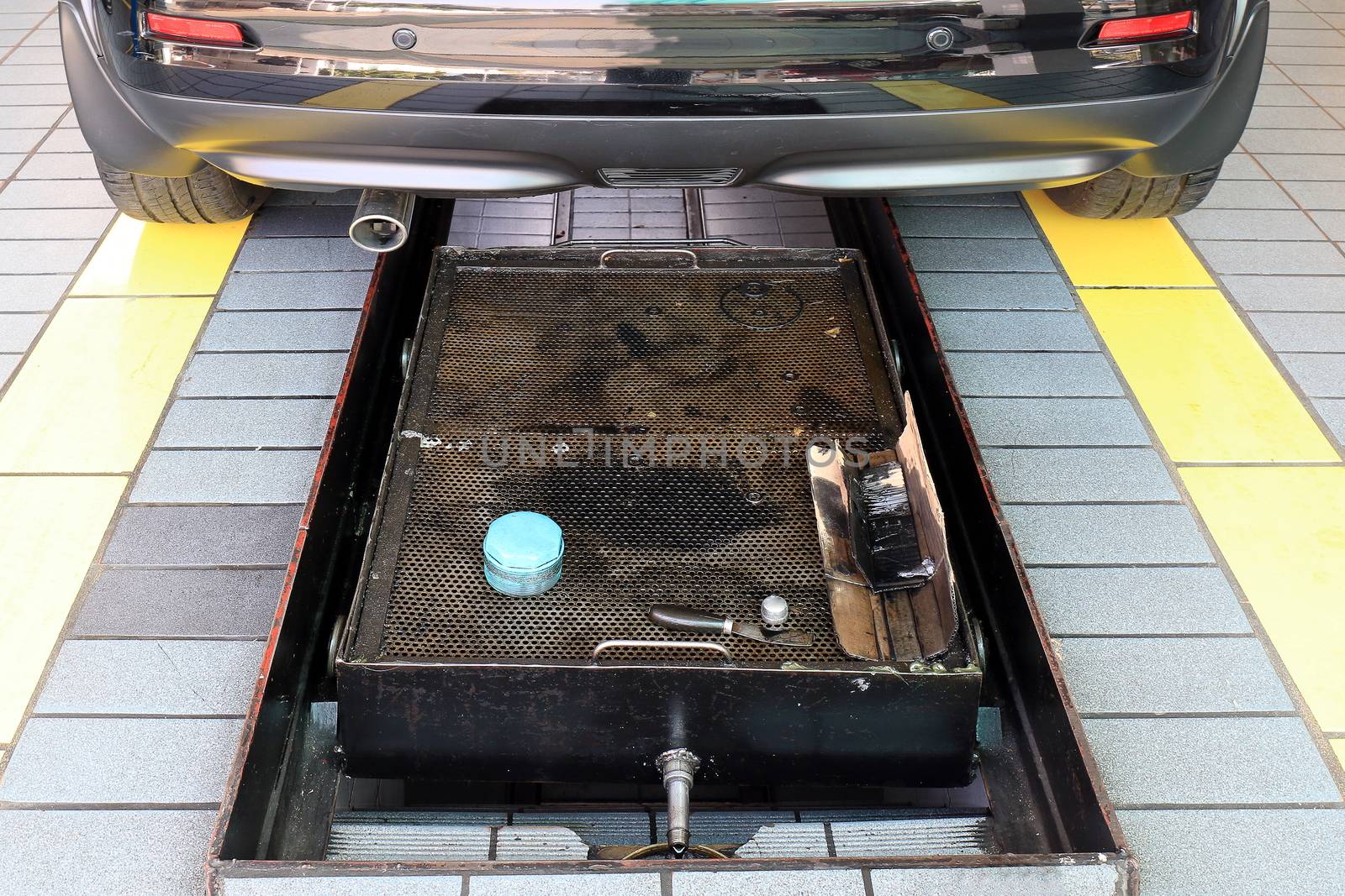 car and inspection pit in the garage, pit for car repair center