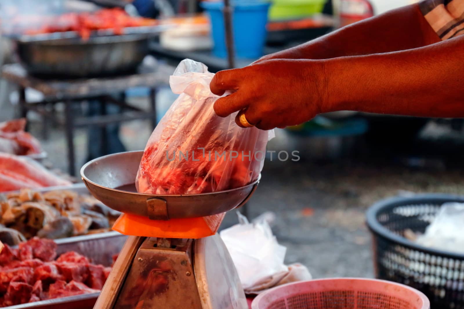 fresh pork market, meat in vegetable market and Merchants are sliced meat with a knife,