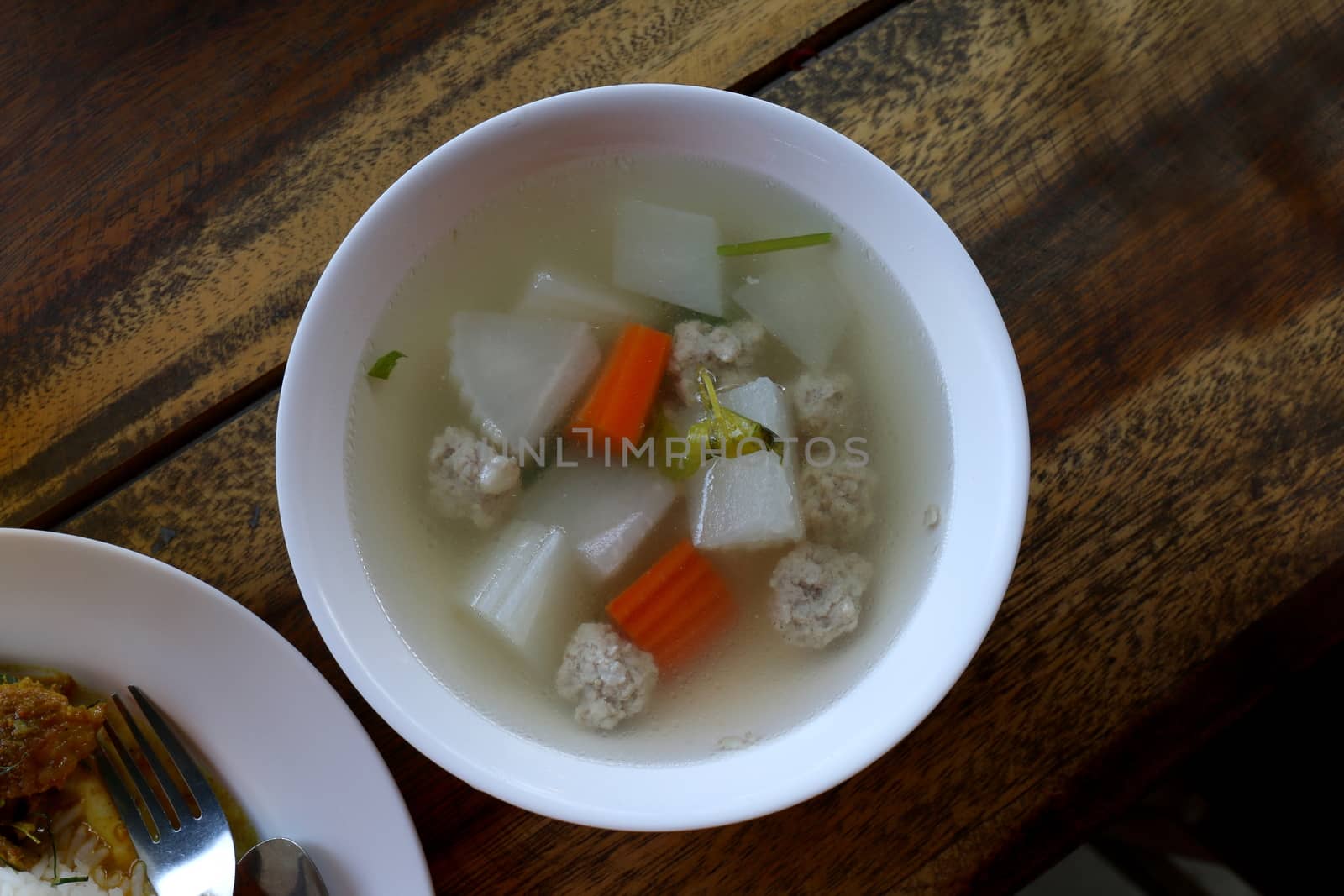 Tom Gaeng Jued Look Chin moo (thai word), Clear glass noodle soup, Clear Soup with Bean Curd and Minced Pork, Clear Soup with Vegetables and Meatballs in white bowl