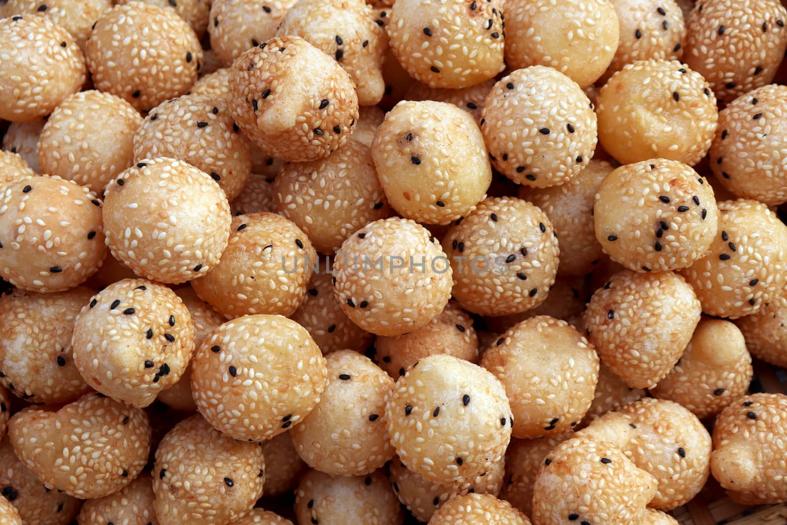 Fried Mung Bean Stuffed Balls, Thai snack Pastry Swan egg with sesame seeds (Kanom Kai Hong), (Khanom Khai Hong) Thai word