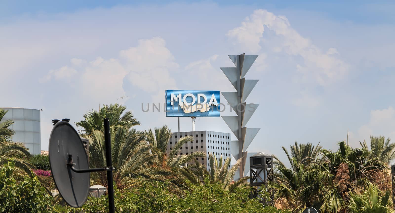 Barcelona, Spain - June 21, 2017 : architectural detail of the MODA tower during the summer, a skyscraper designed by the architects Inigo and Enrique de Leon and built for the 1992 Summer Olympics