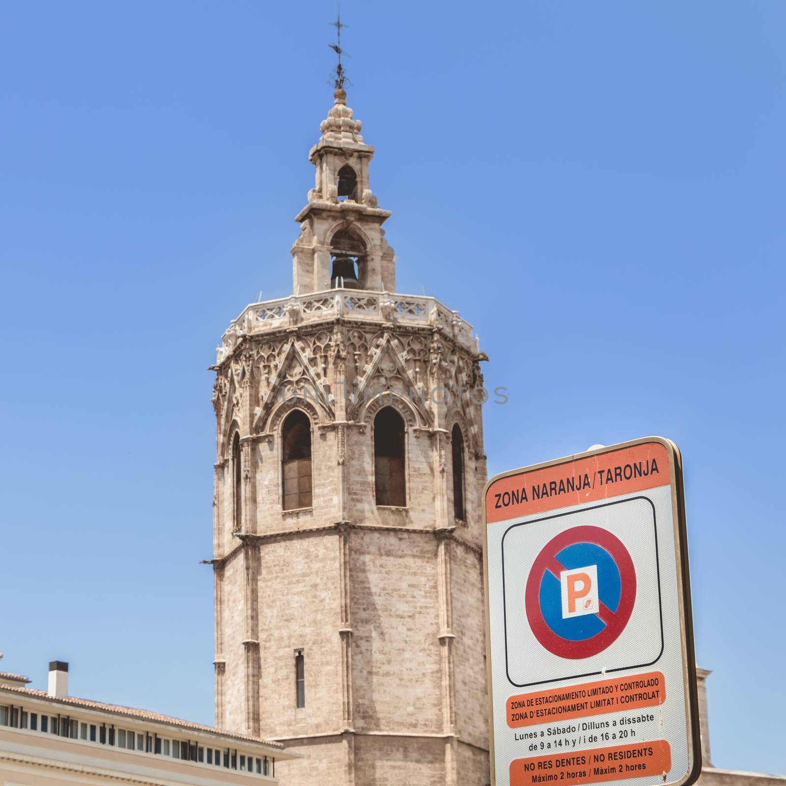 Valencia, Spain - June 16, 2017: road sign indicating an Orange parking area (Zona Naranja) and a limited and controlled parking area in the dentre city on a summer day