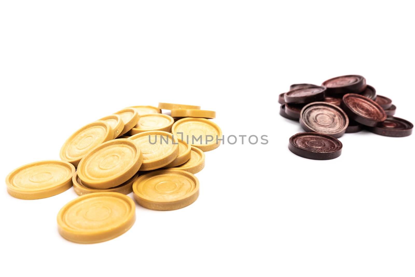 low-end plastic round checkers piece in white background in studio