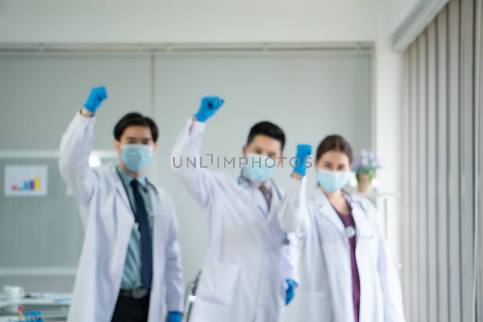 Object blur Soft Focus. Medical team Asian people wear protective masks and meeting together at the hospital.