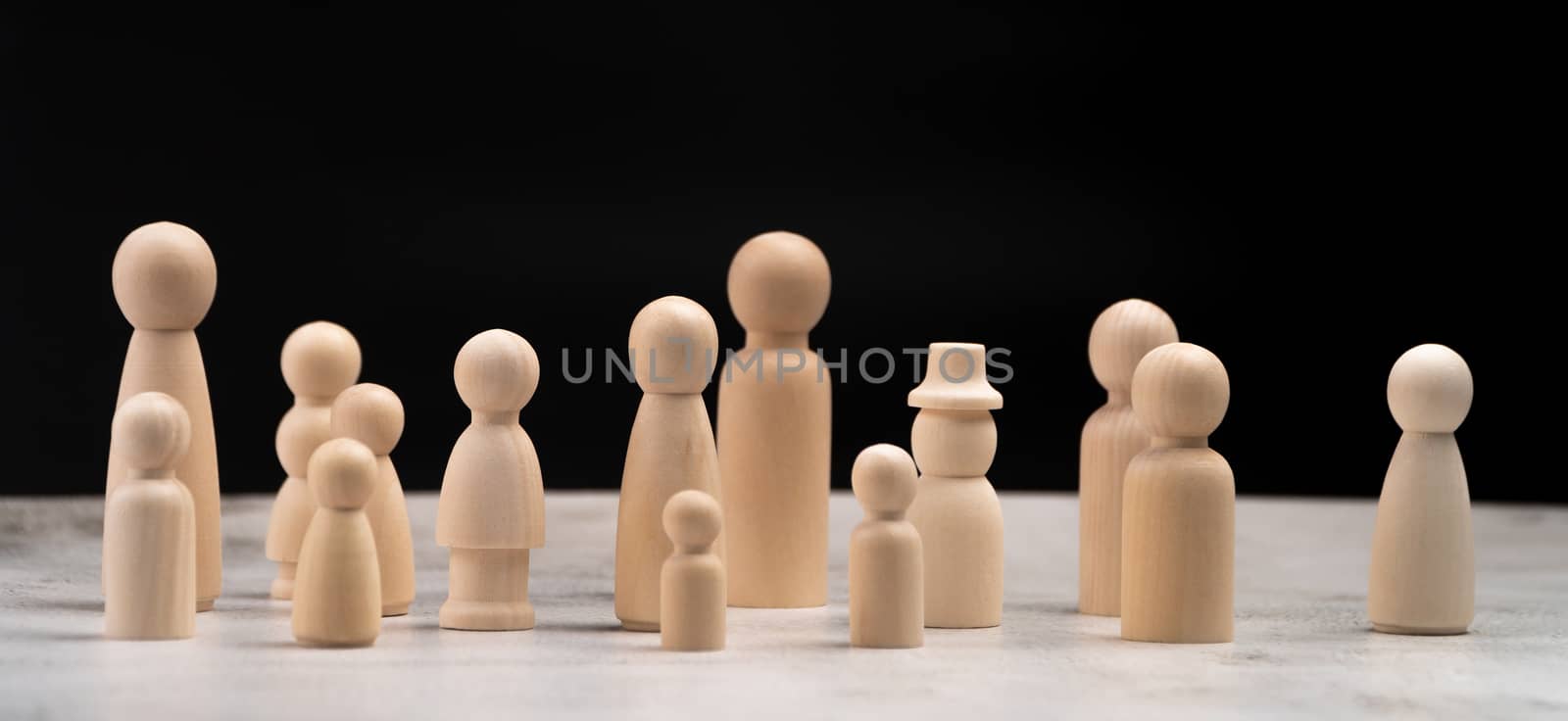 Many wooden human figures, Man and woman standing. Concept of Human resource, Talent management, Recruitment employee