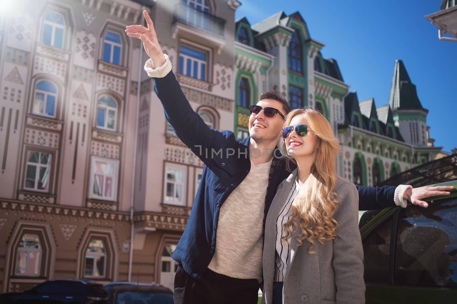 Couple walks in the beautiful city,bright day