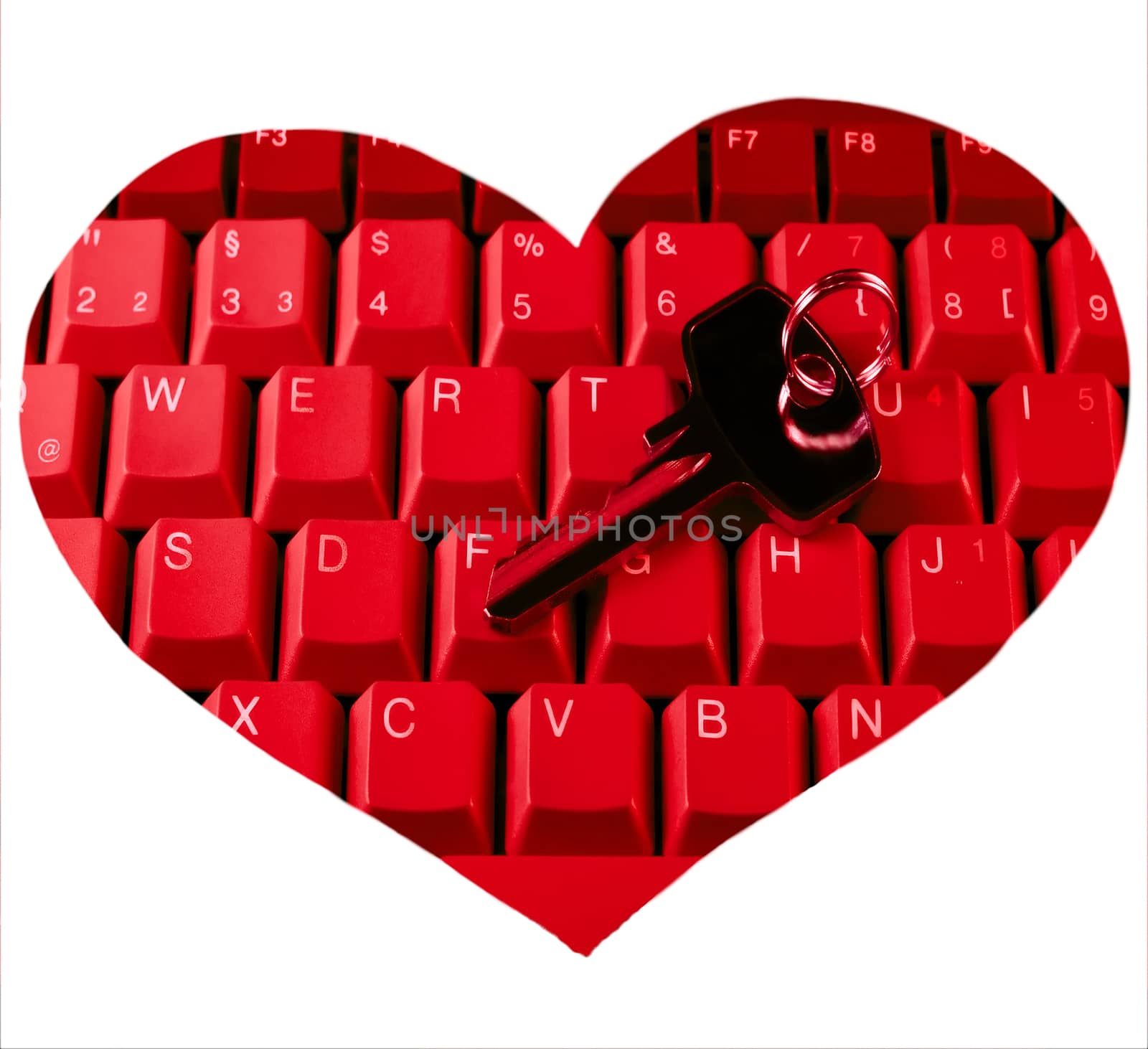 Decorative heart key on keyboard isolated on white background