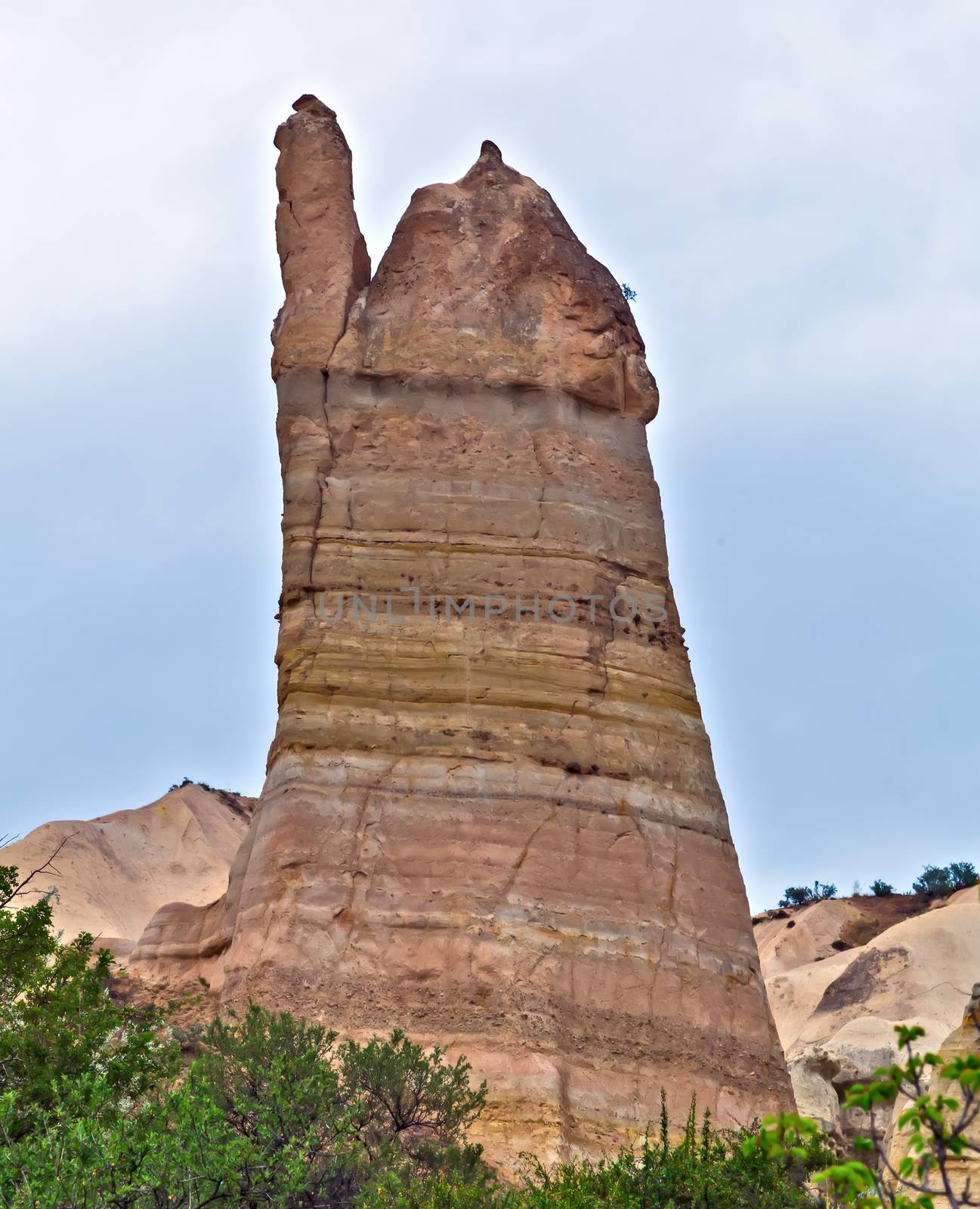 Love valley needles striped, Volcanic tuff named phallic rock pillar. Rocky landscape of Cappadocia in Turkey