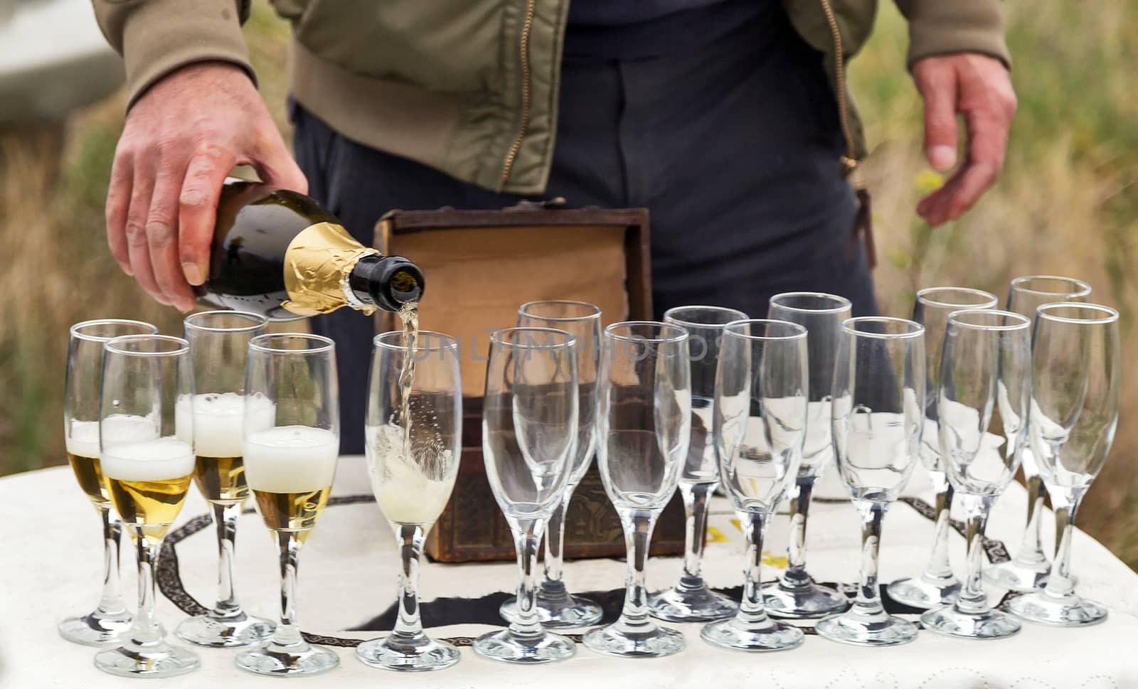 Sparkling Bottle Champagne glass with more glasses, Celebration concept drink