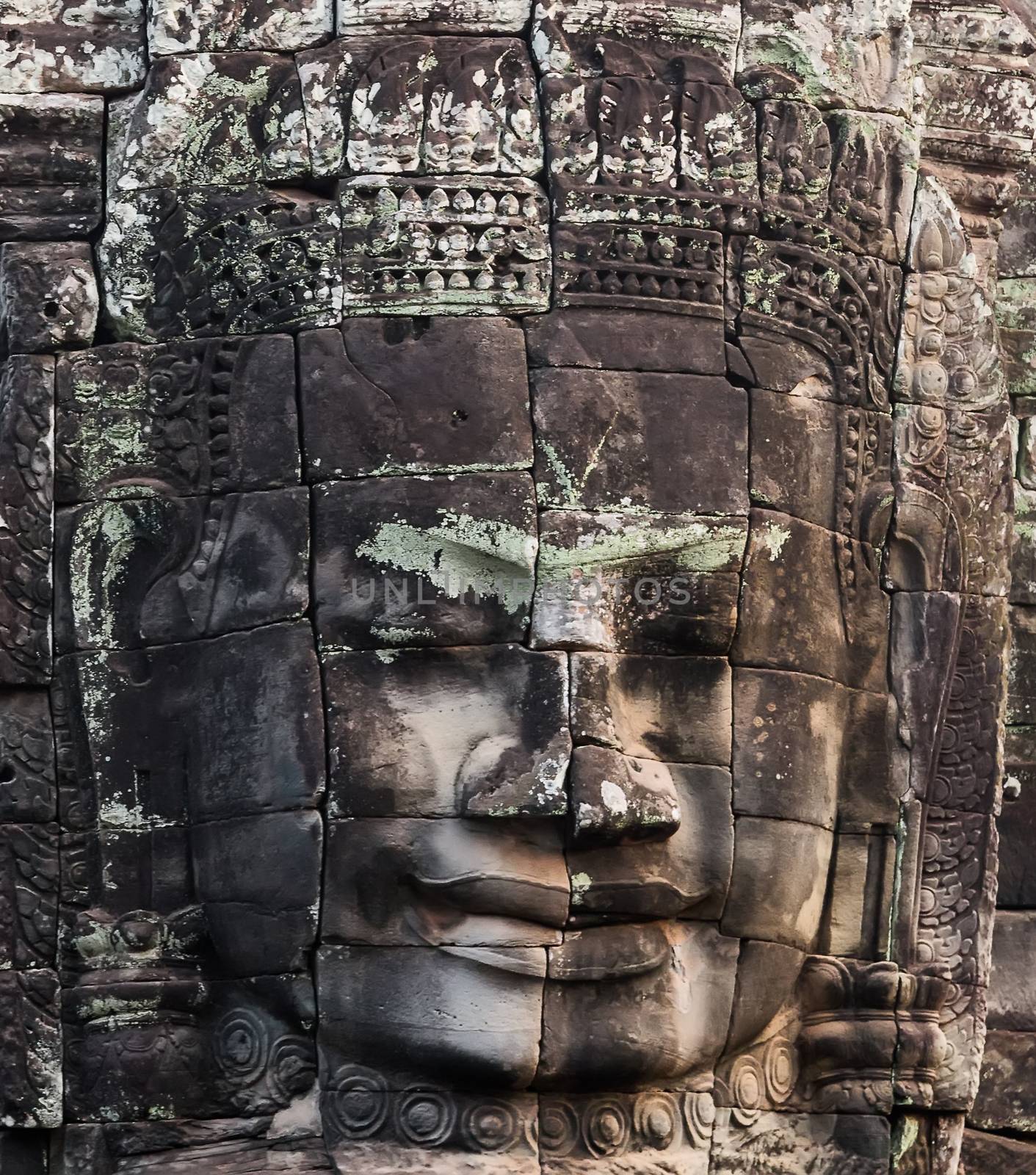 stone faces of king Bayon Temple Angkor Thom, Cambodia. Ancient monument Khmer architecture Kampuchea.