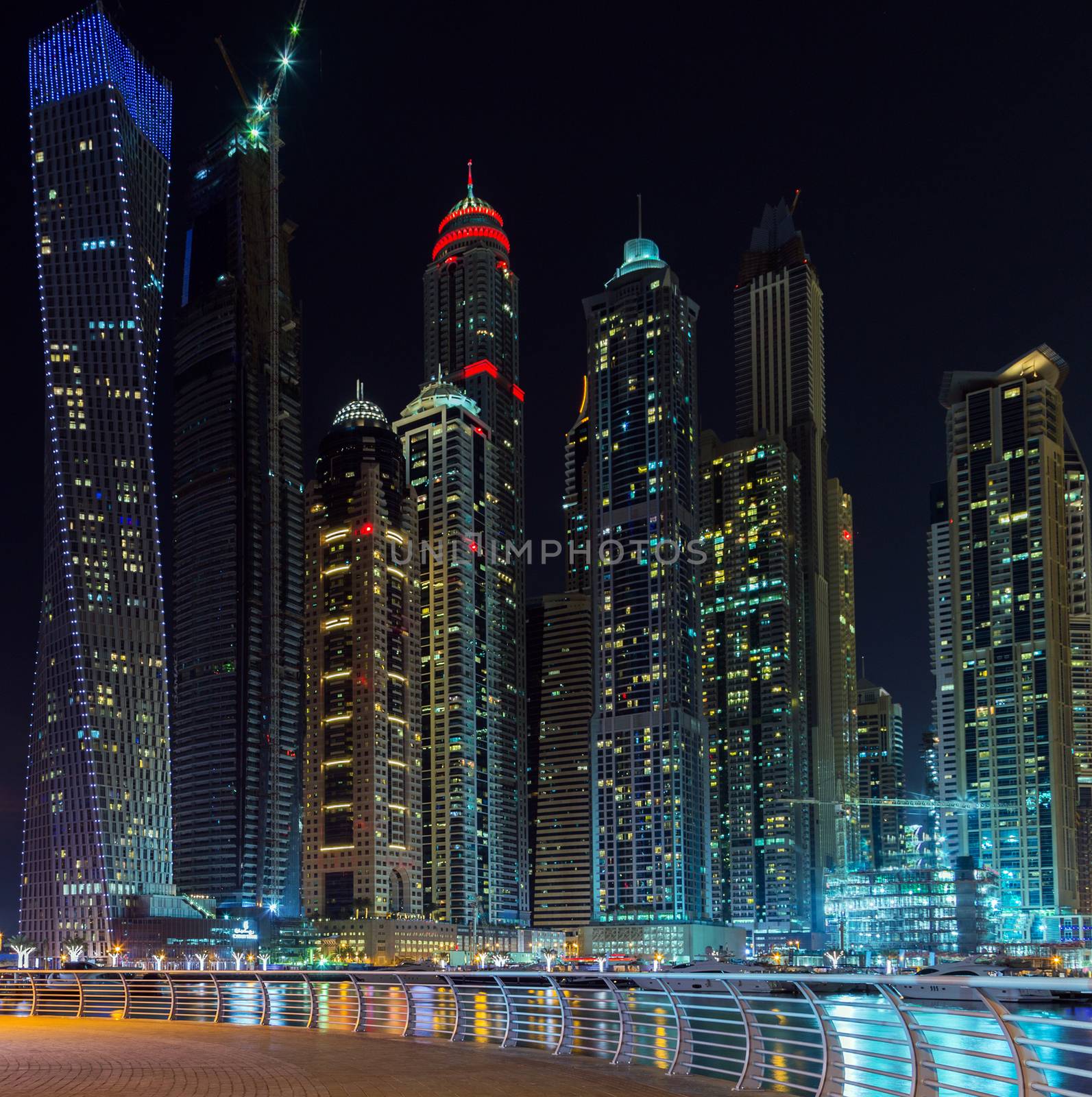 cityscape Dubai marina, Dubai pier, Panorama of illuminated architecture UAE