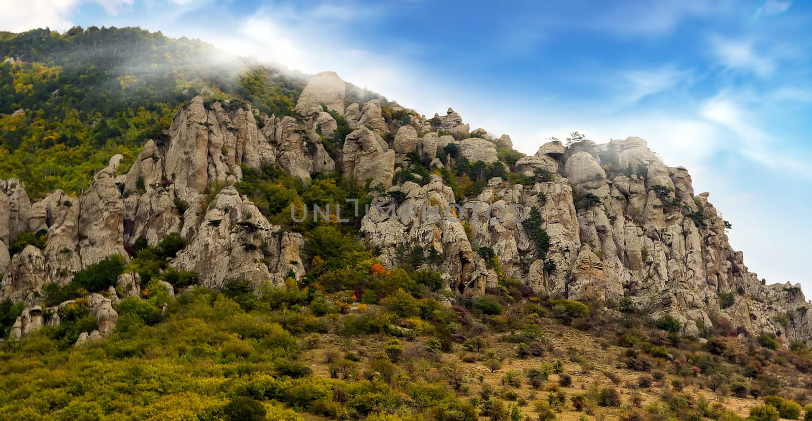 Stone canopy on the rock. Cliffs in the forest.Beautiful mountain landscapes. Crimea