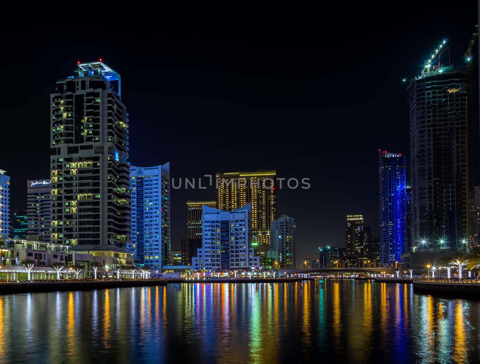 Dubai Marina night skyline Cityscape, luxury new high tech town in United Arab Emirates architecture