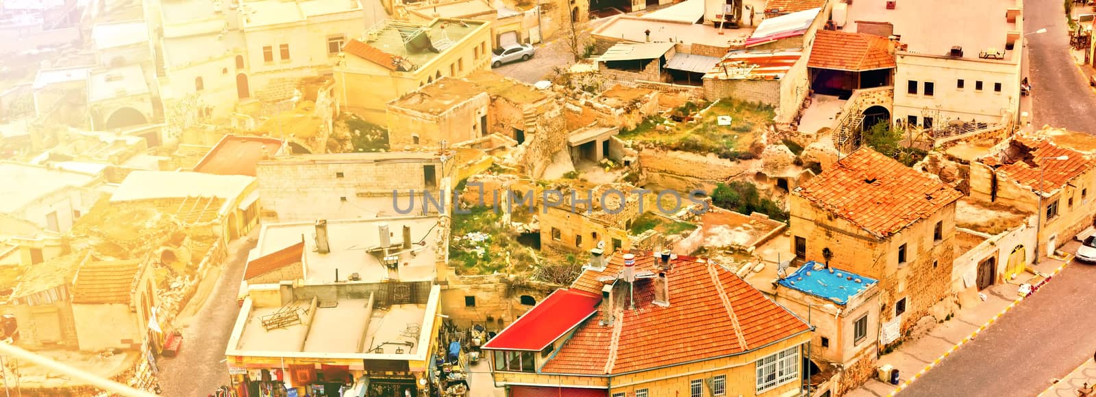 Uchisar castle, Turkey. Rural Cappadocia Mountain landscape panoramic view. Stone houses