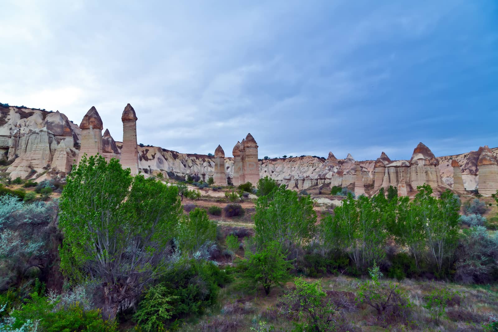 Goreme National Park and the Rock Sites of Cappadocia, Anatolia, Turkey. Volcanic mountain landscape. Travel background
