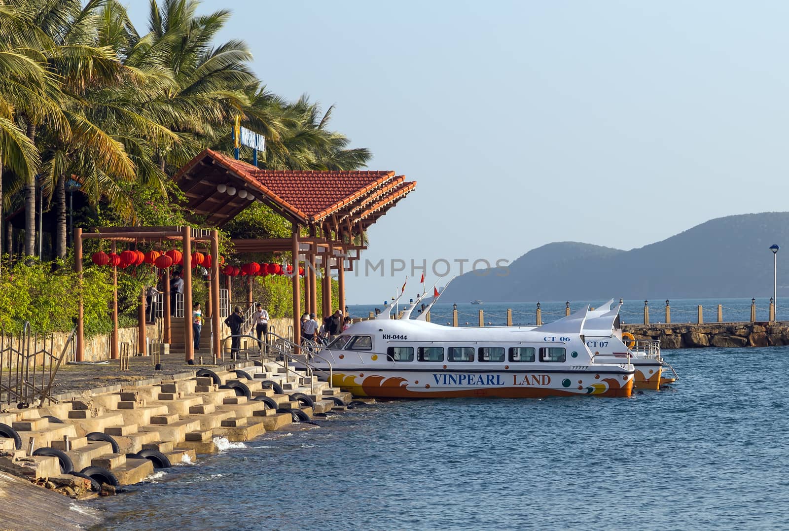 NHA TRANG, VIETNAM - FEB 12, 2015: Sea passenger ferry Terminal and cable car eiffel tower to Vin pearl land Island to the Vinpearl Amusement Park, Nha Trang, Vietnam.