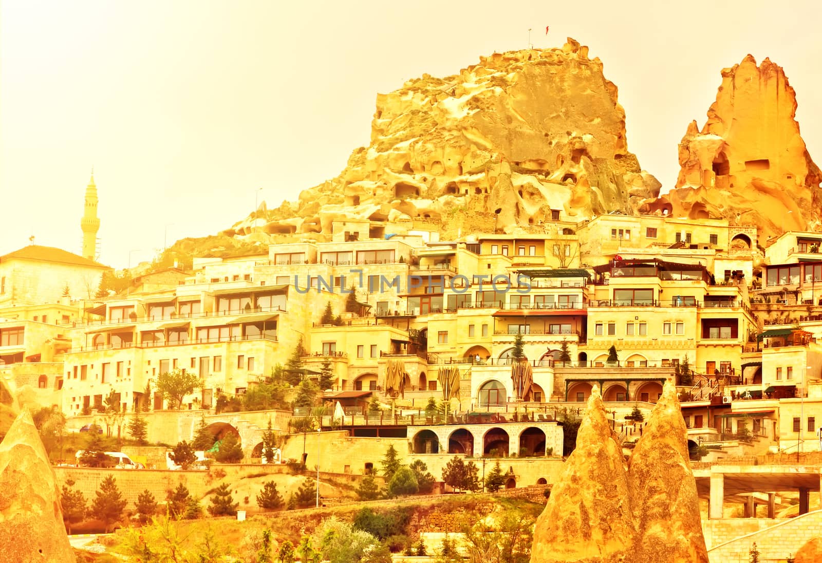Uchisar castle, Turkey. Rural Cappadocia Mountain landscape panoramic view. Stone houses, Aerial photography.