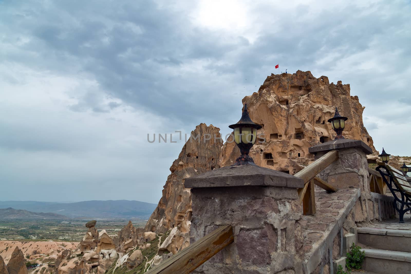 Uchisar castle, Turkey. Rural Cappadocia Mountain landscape panoramic view. Stone houses