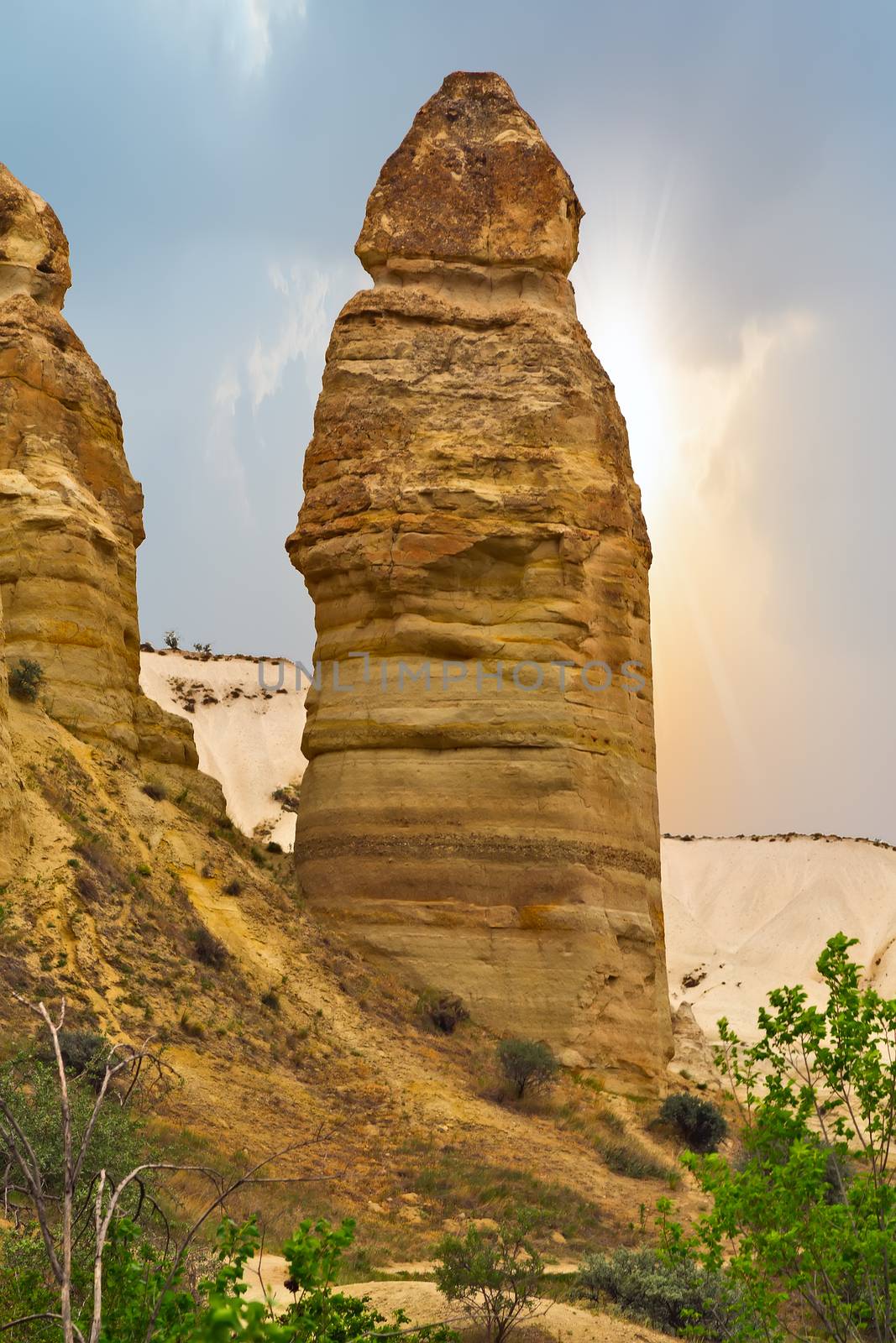 Rising Sun Love Valley because of the pillar like rock formations and walk till Uchisar in Cappadocia, Turkey Travel background