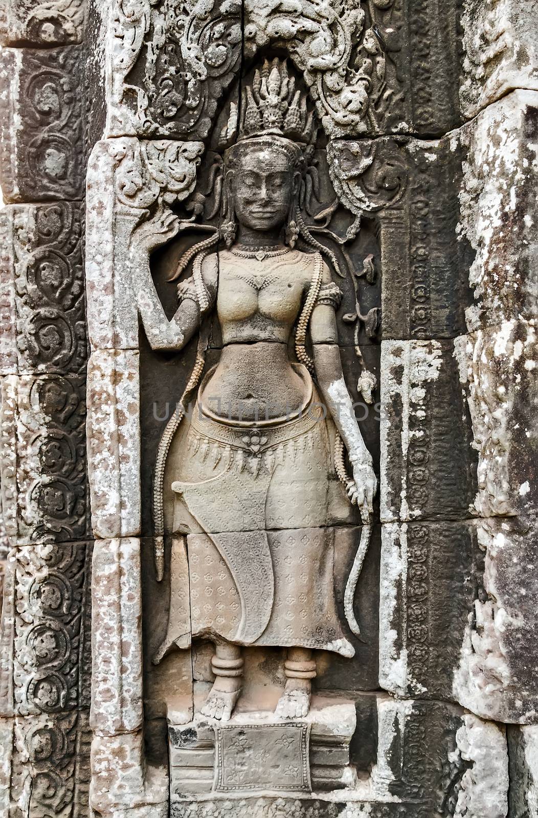 Dancing Apsara Decoration Stone Carving on the wall of Angkor wat, Seam Reap, Cambodia