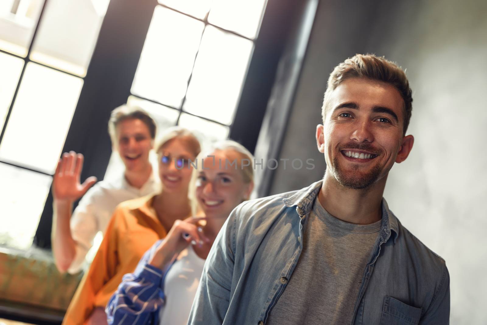 Close up photo of young business people stay together. Unity and teamwork concept.